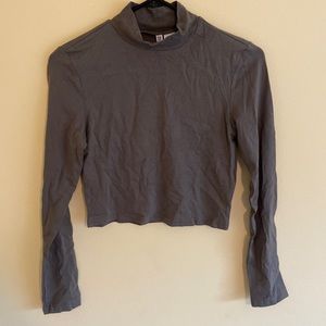 Army green, long sleeve. mock neck, semi cropped tee. With original tags.